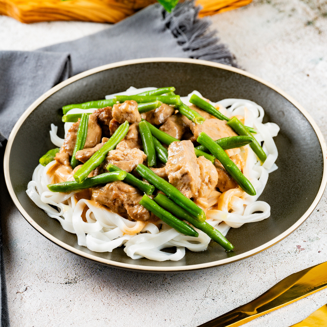 Thai Peanut Pork with Green Beans over Rice Noodles