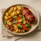 Bacon Wrapped Sausage with Cheesy Veg Stir-Fry & Roast Potatoes