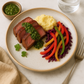 Flank Steak with Herbaceous Chimichurri, Vegetable Sautee & Mash Potato
